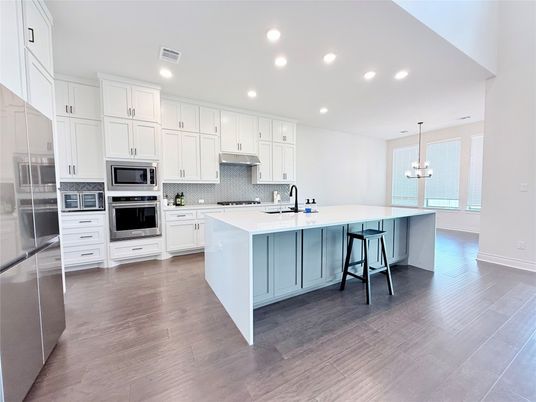 Chandelier, Interior, Kitchen, Pendant Lights, Recessed Lighting, Stainless Steel Appliances, Wood Texture Flooring