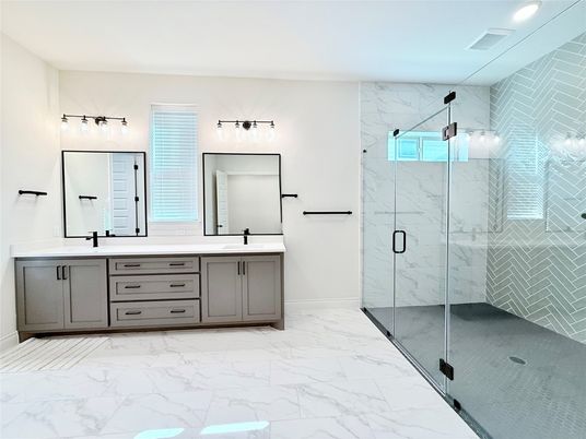 Bathroom, Dual Sink Vanities, Glass Shower, Interior, Marble, Marble Walls, Recessed Lighting