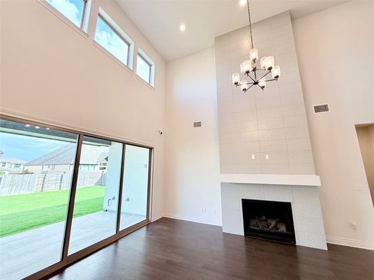 Chandelier, Empty room, Fireplace, Interior, Recessed Lighting, Wood Texture Flooring