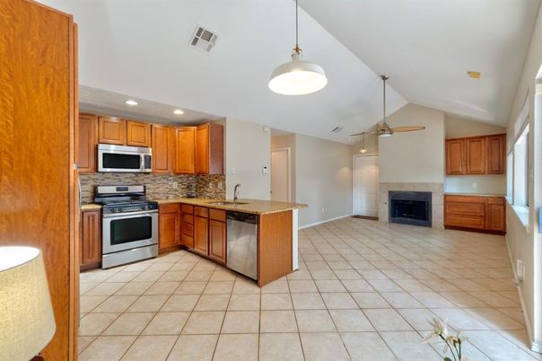 Fireplace, Interior, Kitchen, Pendant Lights, Recessed Lighting, Stainless Steel Appliances