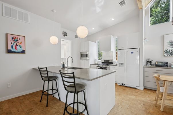 Interior, Kitchen, Pendant Lights, Recessed Lighting, Stainless Steel Appliances, Wood Texture Flooring