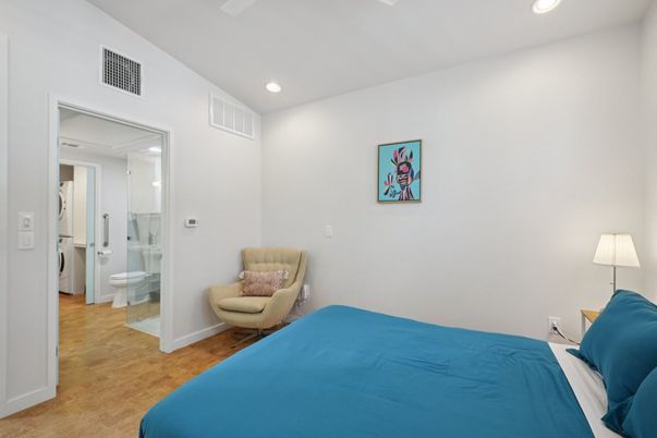 Bathroom, Bedroom, Glass Shower, Interior, Recessed Lighting, Wood Texture Flooring
