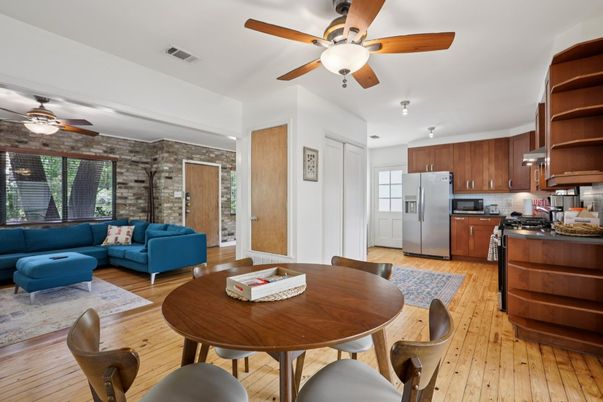 Dining room, Interior, Kitchen, Living room, Stainless Steel Appliances, Stone Walls, Wood Texture Flooring