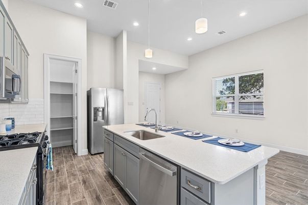 Interior, Kitchen, Pendant Lights, Recessed Lighting, Stainless Steel Appliances, Wood Texture Flooring