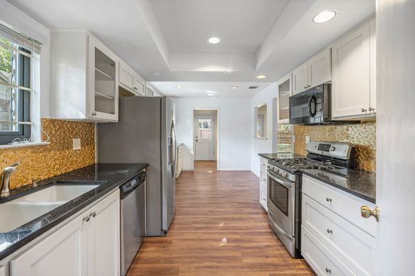 Interior, Kitchen, Recessed Lighting, Stainless Steel Appliances, Wood Texture Flooring