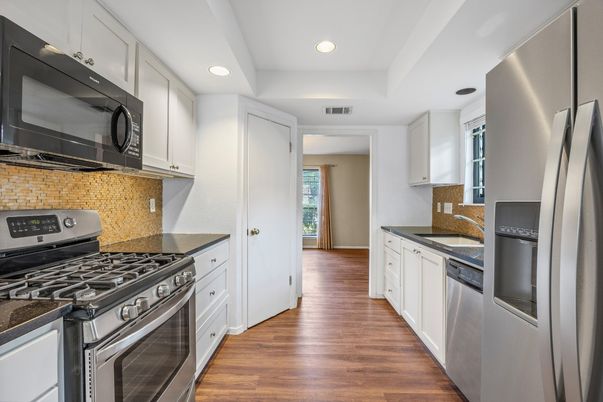 Interior, Kitchen, Recessed Lighting, Stainless Steel Appliances, Wood Texture Flooring
