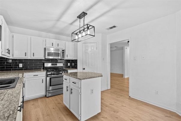 Interior, Kitchen, Pendant Lights, Stainless Steel Appliances, Wood Texture Flooring