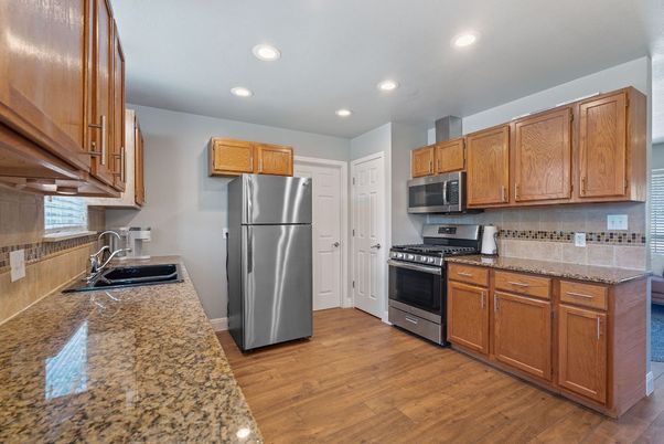 Interior, Kitchen, Recessed Lighting, Stainless Steel Appliances, Wood Texture Flooring