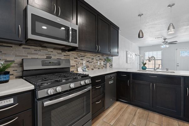 Interior, Kitchen, Pendant Lights, Recessed Lighting, Stainless Steel Appliances, Wood Texture Flooring