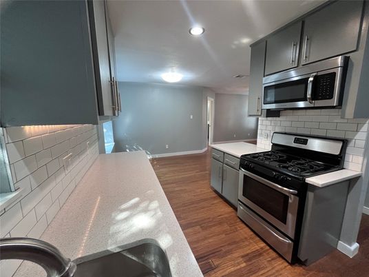Interior, Kitchen, Recessed Lighting, Stainless Steel Appliances, Wood Texture Flooring