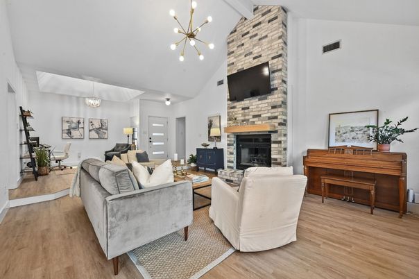 Fireplace, Interior, Living room, Pendant Lights, Piano, Stone Walls, Wood Texture Flooring