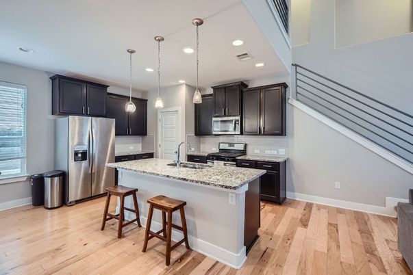 Interior, Kitchen, Pendant Lights, Recessed Lighting, Stainless Steel Appliances, Wood Texture Flooring
