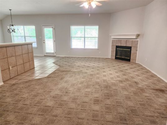 Chandelier, Empty room, Fireplace, Interior