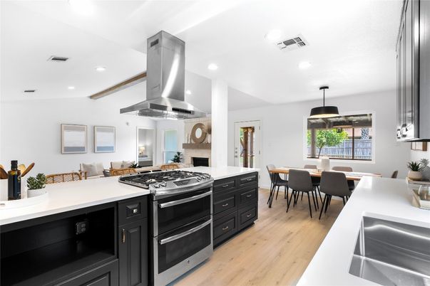 Dining room, Interior, Kitchen, Pendant Lights, Recessed Lighting, Stainless Steel Appliances, Wood Texture Flooring