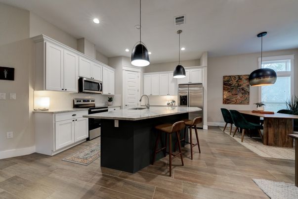 Dining room, Interior, Kitchen, Pendant Lights, Recessed Lighting, Stainless Steel Appliances, Wood Texture Flooring