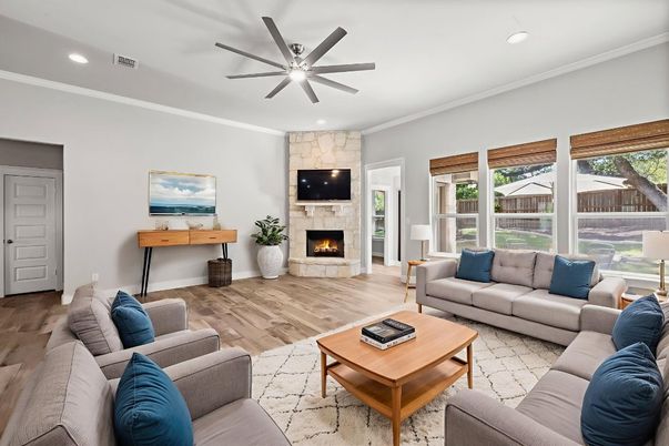 Fireplace, Interior, Living room, Recessed Lighting, Stone Walls, Wood Texture Flooring