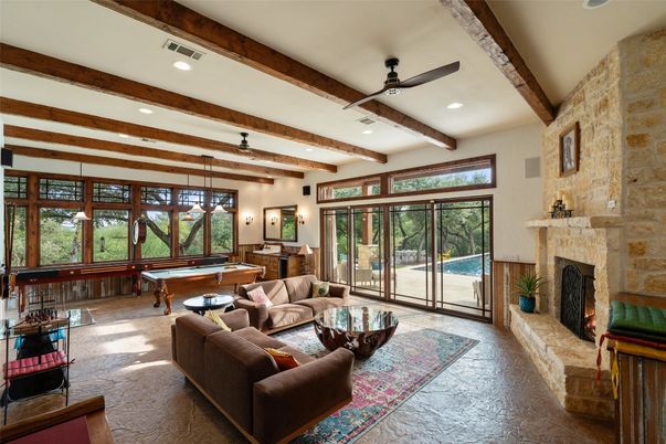 Billiard Table, Fireplace, Game Room, Interior, Living room, Pendant Lights, Recessed Lighting, Stone Walls, Wooden Beams