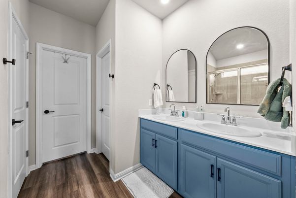 Bathroom, Dual Sink Vanities, Interior, Recessed Lighting, Wood Texture Flooring