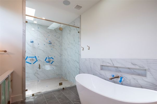 Bathroom, Free Standing Baths, Glass Shower, Interior, Marble Walls, Recessed Lighting