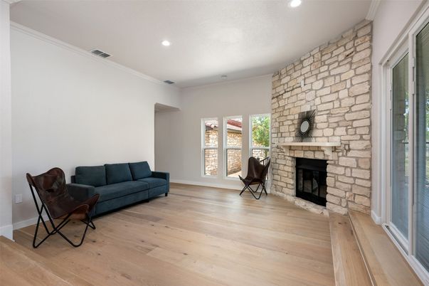 Fireplace, Interior, Recessed Lighting, Stone Walls, Wood Texture Flooring