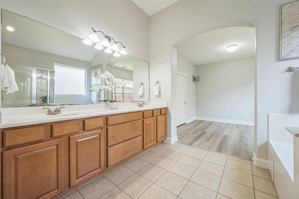 Bathroom, Dual Sink Vanities, Interior, Recessed Lighting, Wood Texture Flooring