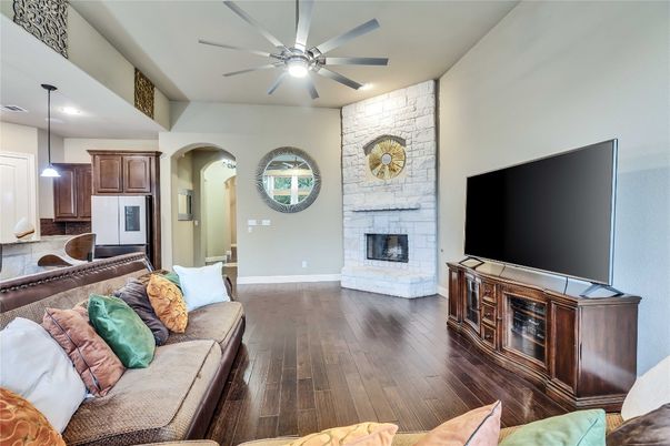 Fireplace, Interior, Kitchen, Living room, Pendant Lights, Recessed Lighting, Stone Walls, Wood Texture Flooring