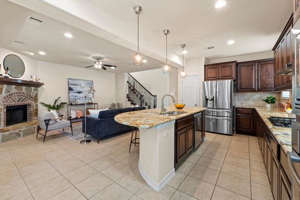 Fireplace, Interior, Kitchen, Living room, Pendant Lights, Recessed Lighting, Stainless Steel Appliances