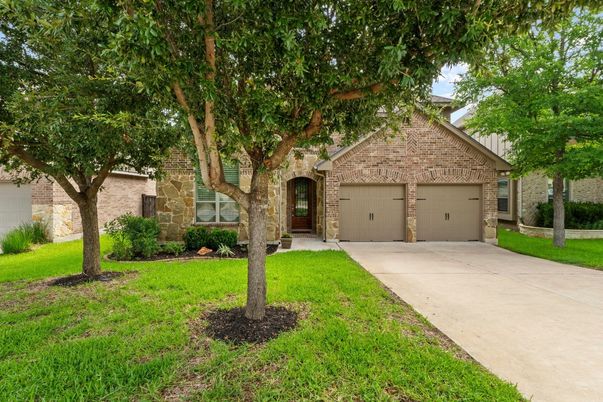 Attached, Backyard, Exterior, Facade, Brick Facade, Brick Traditional