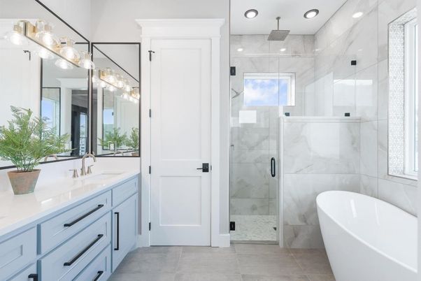 Bathroom, Dual Sink Vanities, Free Standing Baths, Glass Shower, Interior, Marble Walls, Recessed Lighting