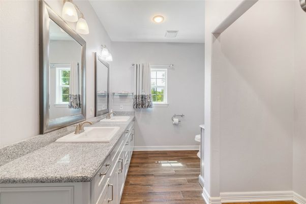 Bathroom, Dual Sink Vanities, Interior, Recessed Lighting, Wood Texture Flooring