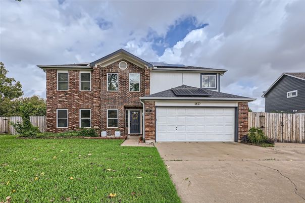 Attached, Exterior, Facade, Brick Facade, Solar Panels, Brick Traditional