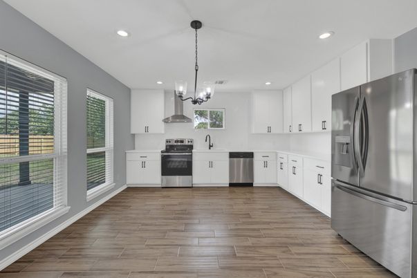 Chandelier, Interior, Kitchen, Pendant Lights, Recessed Lighting, Stainless Steel Appliances, Wood Texture Flooring