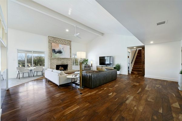 Fireplace, Interior, Living room, Recessed Lighting, Stone Walls, Wood Texture Flooring