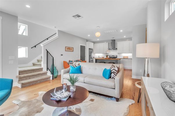 Dining room, Interior, Kitchen, Living room, Pendant Lights, Recessed Lighting, Stainless Steel Appliances, Wood Texture Flooring