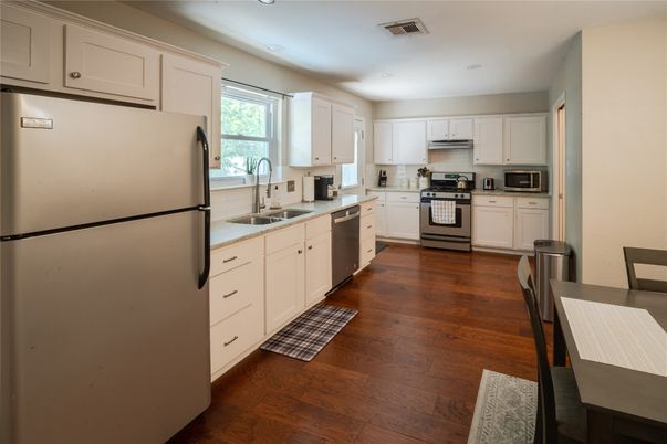 Interior, Kitchen, Recessed Lighting, Stainless Steel Appliances, Wood Texture Flooring
