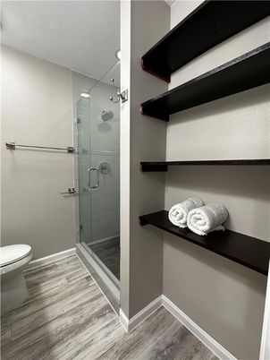 Bathroom, Glass Shower, Interior, Wood Texture Flooring