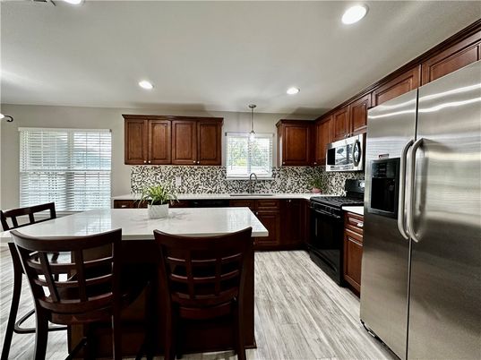 Interior, Kitchen, Pendant Lights, Recessed Lighting, Stainless Steel Appliances, Wood Texture Flooring