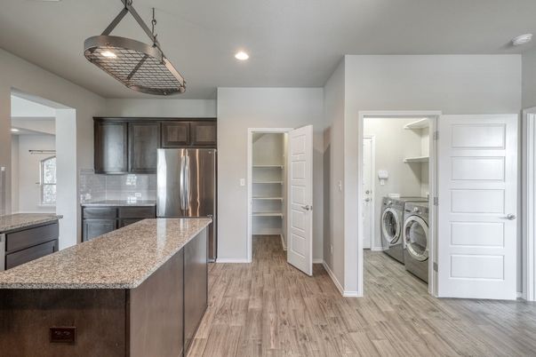 Interior, Kitchen, Recessed Lighting, Utility Closets, Washer, Wood Texture Flooring