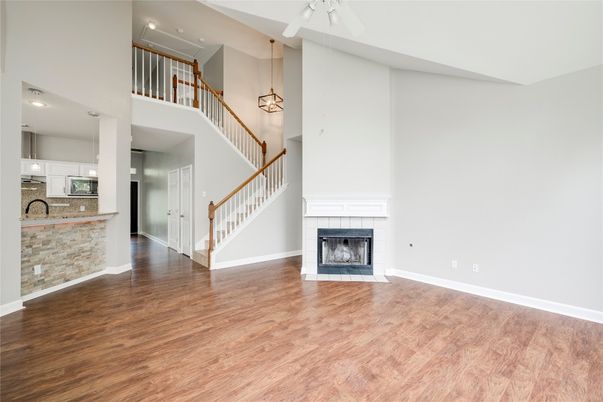 Fireplace, Interior, Pendant Lights, Recessed Lighting, Wood Texture Flooring