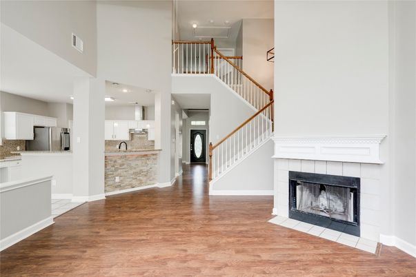 Fireplace, Interior, Kitchen, Recessed Lighting, Wood Texture Flooring