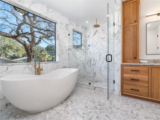 Bathroom, Free Standing Baths, Glass Shower, Interior, Marble, Marble Walls, Recessed Lighting
