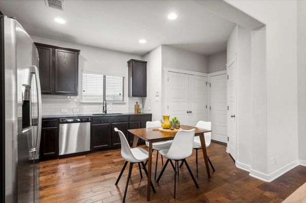 Dining room, Interior, Kitchen, Recessed Lighting, Stainless Steel Appliances, Wood Texture Flooring