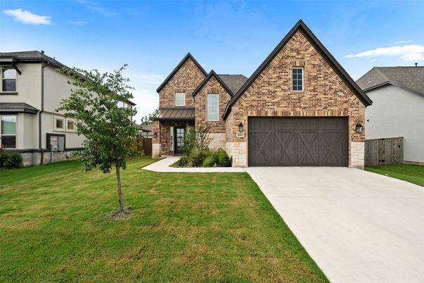 Attached, Exterior, Facade, Brick Facade, Brick Traditional