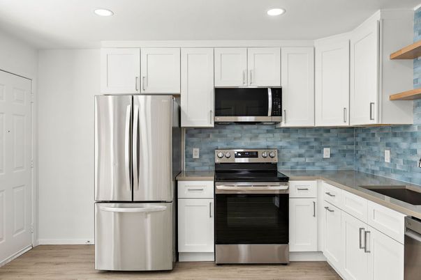 Interior, Kitchen, Recessed Lighting, Stainless Steel Appliances, Wood Texture Flooring