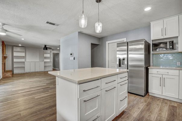 Interior, Kitchen, Pendant Lights, Recessed Lighting, Stainless Steel Appliances, Wood Texture Flooring