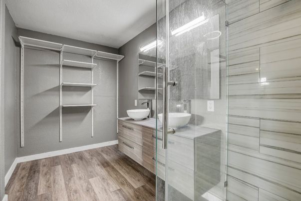 Bathroom, Dual Sink Vanities, Glass Shower, Interior, Walk-in Closets, Wood Texture Flooring