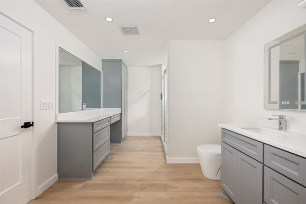 Bathroom, Dual Sink Vanities, Interior, Recessed Lighting, Wood Texture Flooring
