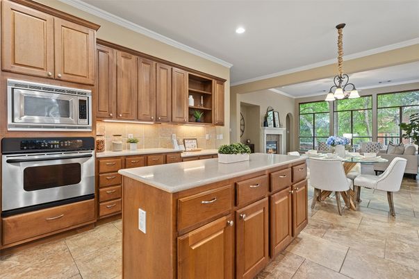 Dining room, Fireplace, Interior, Kitchen, Living room, Pendant Lights, Recessed Lighting, Stainless Steel Appliances