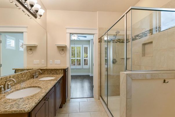 Bathroom, Dual Sink Vanities, Glass Shower, Interior, Wood Texture Flooring