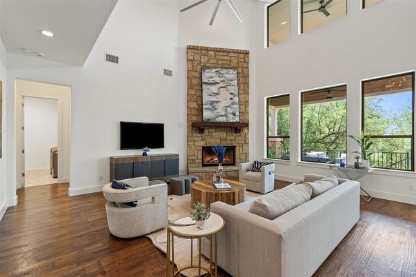 Fireplace, Interior, Living room, Recessed Lighting, Stone Walls, Wood Texture Flooring